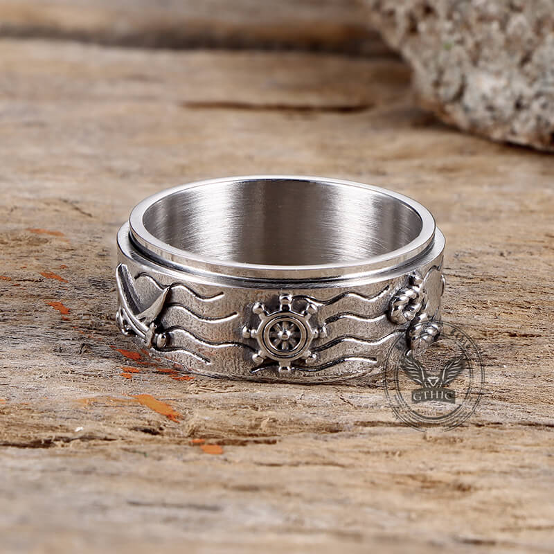 Anillo giratorio de acero inoxidable con brújula y ancla