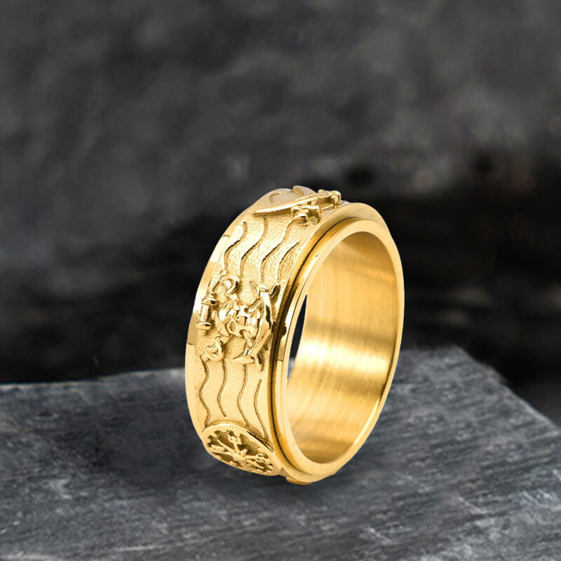 Anillo giratorio de acero inoxidable con brújula y ancla