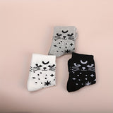 2 pares de calcetines con estampado de estrellas y lunas, cómodos y transpirables, medias de tubo medio para mujer.