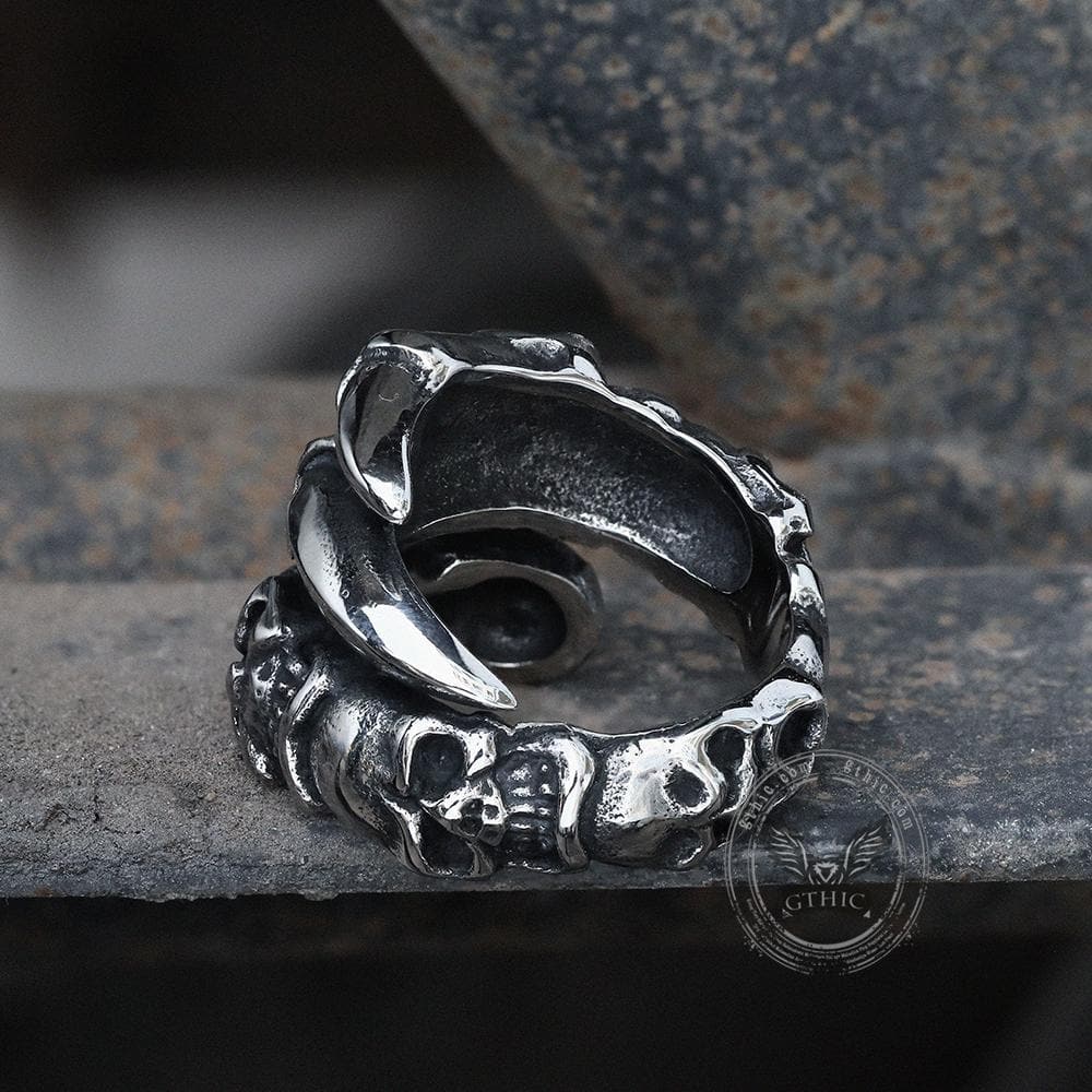 Anillo de calavera de acero inoxidable con garra de bestia