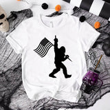 Bigfoot Holding A Flag Short Sleeve T-shirt