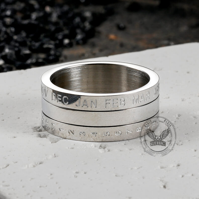 Anillo giratorio de acero inoxidable con diamantes y calendario