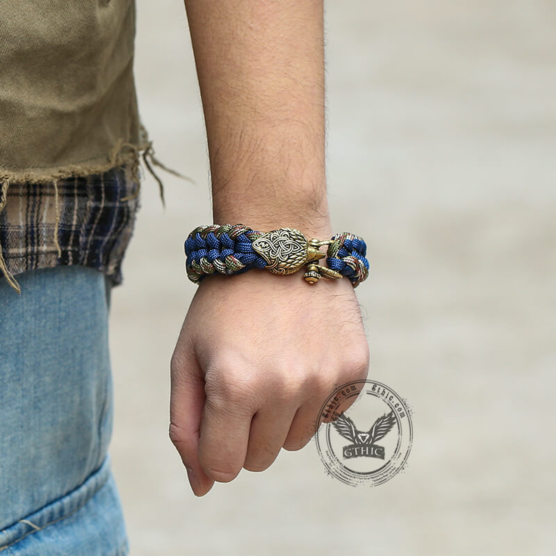 Pulsera de paracord trenzada de latón con nudo celta y águila