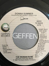 The Woman In Me / Love Is In Control (Finger On The Trigger) | Near Mint (NM) Generic