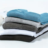 5 pares de calcetines tobilleros lisos para hombre, cómodos, transpirables, suaves y absorbentes del sudor, ideales para exteriores.