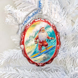 Coastal Christmas Ornaments  Santa on the Surfboard Keepsake Glass Ornaments by G. Debrekht - Coastal Holiday Decor - 777392