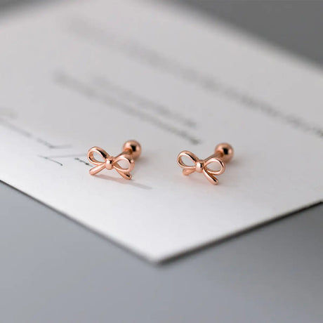 Fashion Hollowed-out Bowknot Thread Stud Earrings - Lootquake