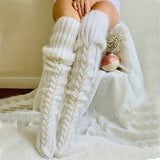 A Pair Of Thigh-high, Warm And Soft Socks For Autumn And Winter, With Thick Knitted Fabric Above The Knees, Perfect For Keeping Your Legs Warm During School, Travel, And Outdoor Activities.