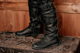 Black leather high boots with buckles
