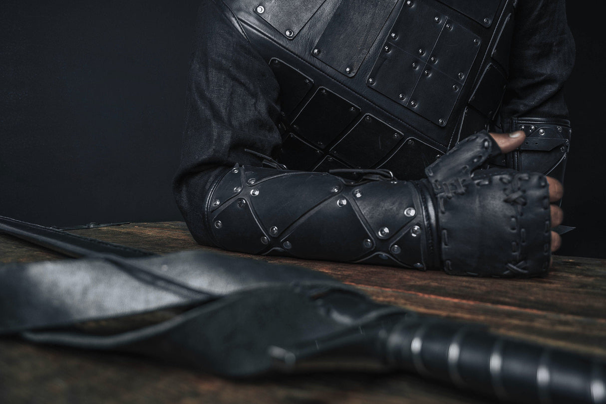 Medieval leather bracers with hand protection