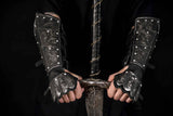 Medieval leather bracers with hand protection