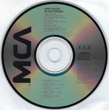 On Solid Ground (CD) | Near Mint (NM) Near Mint (NM)