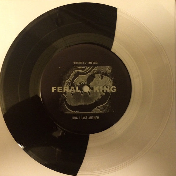 Feral King (HALF CLEAR / HALF BLACK VINYL 7") | Mint (M) Mint (M)