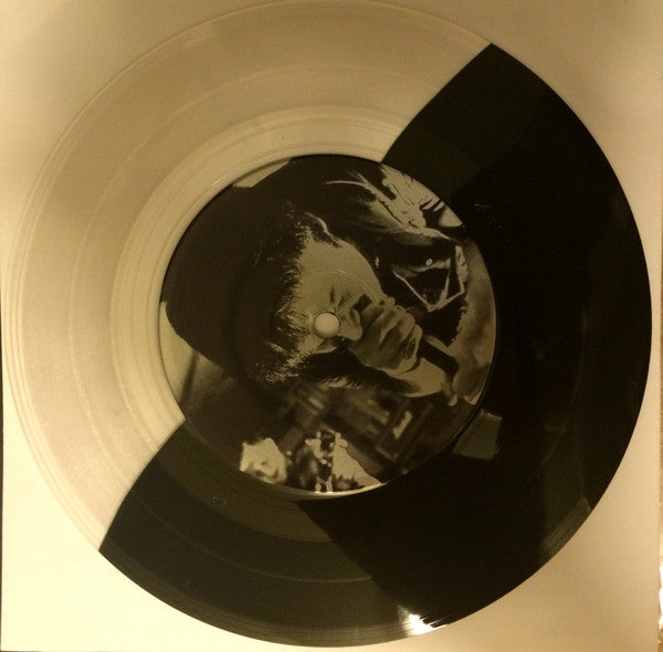Feral King (HALF CLEAR / HALF BLACK VINYL 7") | Mint (M) Mint (M)