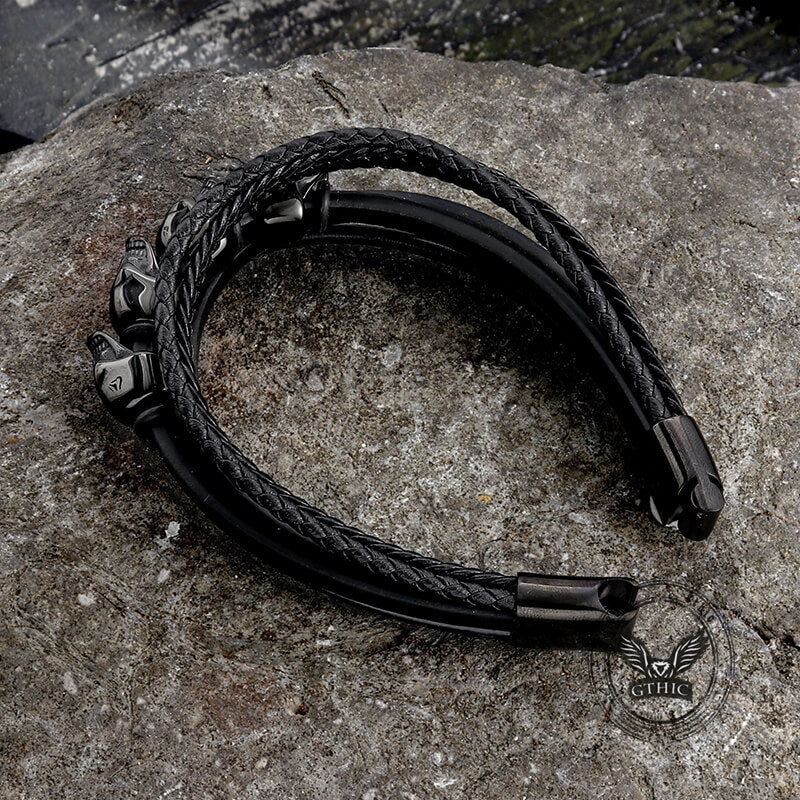Pulsera de cuero trenzado multicapa con cuatro calaveras punk