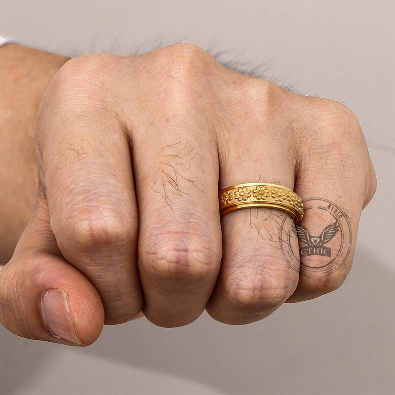 Anillo giratorio de acero inoxidable con diseño de margaritas sencillas