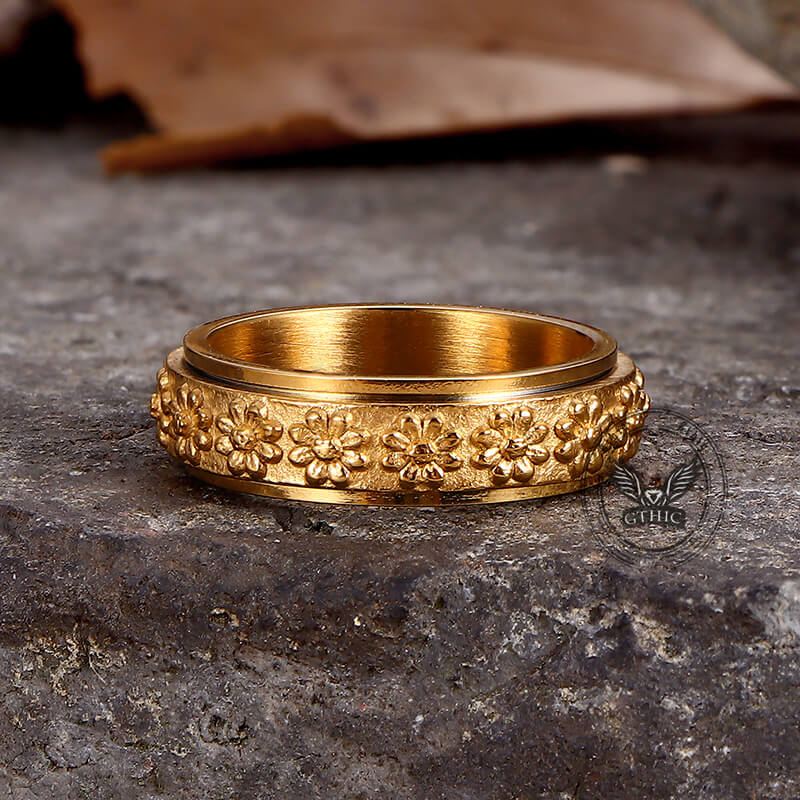 Anillo giratorio de acero inoxidable con diseño de margaritas sencillas