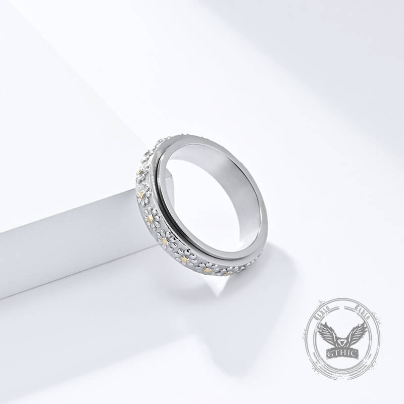 Anillo giratorio de acero inoxidable con diseño de margaritas sencillas