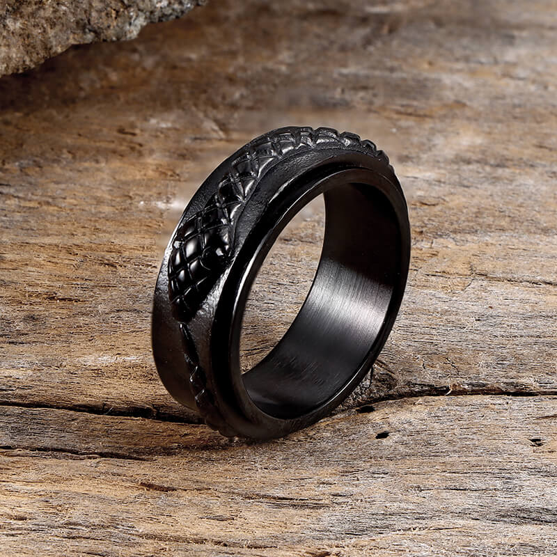 Anillo giratorio de acero inoxidable con diseño de serpiente entrelazada